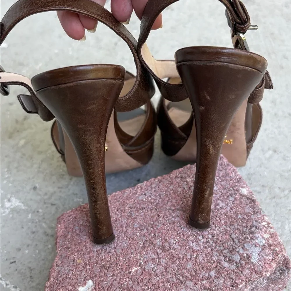 Prada crisscross open toe platforms